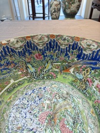 A Chinese Canton famille rose 'peacock' punch bowl, 19th C.