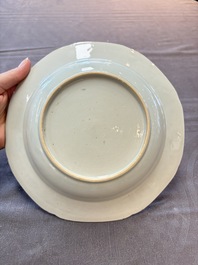 Six Chinese blue and white plates and a dish with landscape design, 18th C.