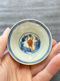 Eight Chinese blue, white and iron-red cups and twelve saucers, Kangxi/Yongzheng