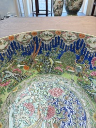 A Chinese Canton famille rose 'peacock' punch bowl, 19th C.