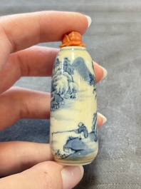 Two Chinese blue, white and copper-red snuff bottles and two blue and white snuff bottles, 19th C.