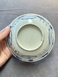 Five Chinese blue and white 'klapmuts' bowls with figural design, Wanli