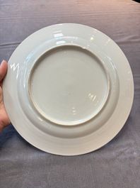 Six Chinese blue and white plates and a dish with landscape design, 18th C.