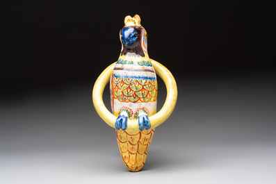 A white Dutch Delft cow milker group and a polychrome Dutch Delft parrot, 18/19th C.
