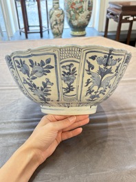 A Chinese blue and white 'kraak' bowl with ducks and flowers, Wanli