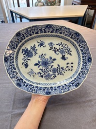 Seven Chinese blue and white plates and dishes with floral design, 18th C.