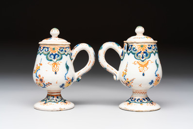 A pair of polychrome Dutch Delft mustard jars and covers, 18th C.