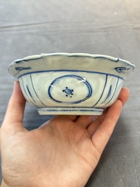 Five Chinese blue and white 'klapmuts' bowls with figural design, Wanli