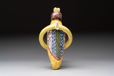 A white Dutch Delft cow milker group and a polychrome Dutch Delft parrot, 18/19th C.