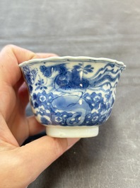 Eight Chinese blue, white and iron-red cups and twelve saucers, Kangxi/Yongzheng