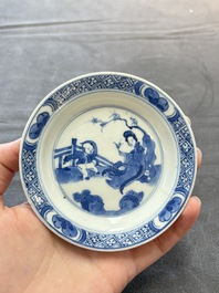 Eight Chinese blue, white and iron-red cups and twelve saucers, Kangxi/Yongzheng