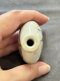 A Chinese famille rose 'cricket' snuff bottle, Daoguang mark and of the period