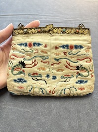 A Chinese embroidered silk purse with red coral- and turquoise-inlaid gilt-bronze mounts, Qing