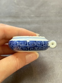 A fine Chinese archaistic blue and white bird feeder with chilong design, Qianlong mark and of the period