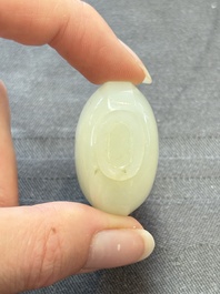 A Chinese white jade snuff bottle with lion-form handles, 19th C.
