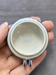 A fine Chinese archaistic blue and white bird feeder with chilong design, Qianlong mark and of the period
