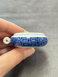 A fine Chinese archaistic blue and white bird feeder with chilong design, Qianlong mark and of the period