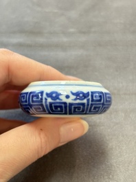 A fine Chinese archaistic blue and white bird feeder with chilong design, Qianlong mark and of the period