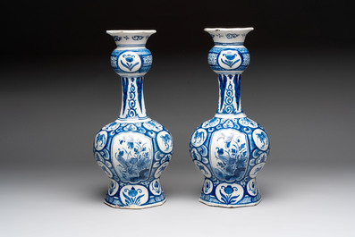 A pair of blue and white Dutch Delft vases with floral design, 18th C.