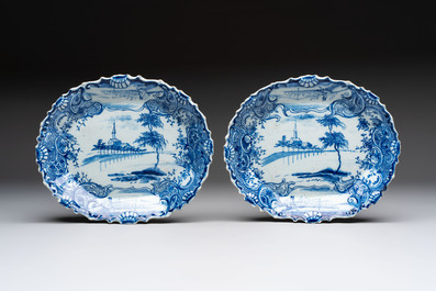 Two blue and white Dutch Delft strawberry strainers on stands, 18th C.