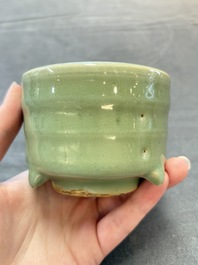 A small Chinese Longquan celadon cylindrical tripod censer, Ming