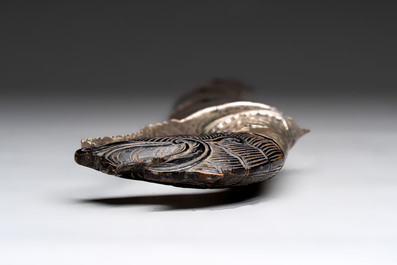 An Indonesian 'pedang palembang' sword with a silver-alloy-mounted and tortoiseshell-veneered scabbard, Sumatra, 19th C.