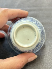 Ten Chinese blue and white cups and eleven saucers, Kangxi