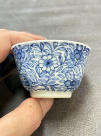 Ten Chinese blue and white cups and eleven saucers, Kangxi