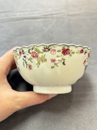 A pair of Chinese famille rose 'tobacco leaf' cups and saucers, Qianlong
