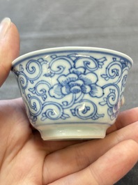 Ten Chinese blue and white cups and eleven saucers, Kangxi