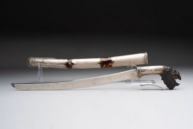An Indonesian 'pedang palembang' sword with a silver-alloy-mounted and tortoiseshell-veneered scabbard, Sumatra, 19th C.