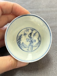 Ten Chinese blue and white cups and eleven saucers, Kangxi