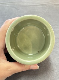 A small Chinese Longquan celadon cylindrical tripod censer, Ming