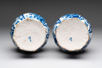 A pair of blue and white Dutch Delft vases with floral design, 18th C.