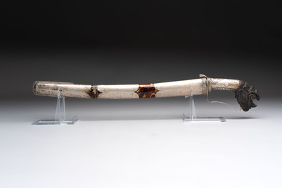An Indonesian 'pedang palembang' sword with a silver-alloy-mounted and tortoiseshell-veneered scabbard, Sumatra, 19th C.