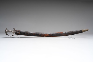 A fine Mughal silver-damascened tulwar with scabbard, India, 19th C.