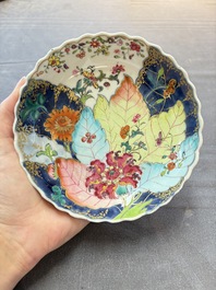 A pair of Chinese famille rose 'tobacco leaf' cups and saucers, Qianlong