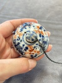 Three Chinese Imari-style covered teapots and a blue and white milk jug, Kangxi/Qianlong