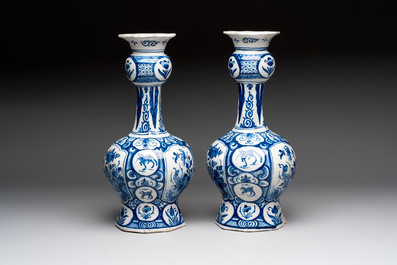 A pair of blue and white Dutch Delft vases with floral design, 18th C.