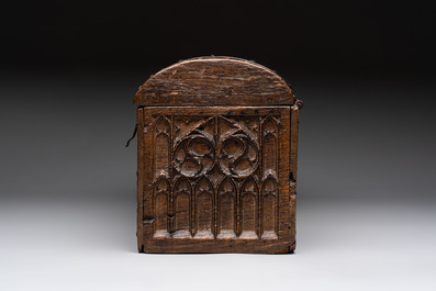A Gothic Revival oak casket with wrought-iron mounts, 19th C.