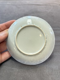 Ten Chinese blue and white cups and eleven saucers, Kangxi