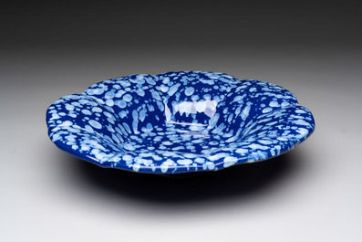 A Nevers white-splashed blue-ground '&agrave; la bougie' dish, France, late 17th C.