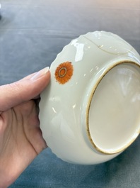 A pair of Chinese famille rose 'tobacco leaf' cups and saucers, Qianlong