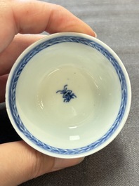 Ten Chinese blue and white cups and eleven saucers, Kangxi
