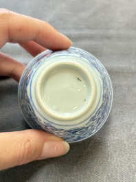 Ten Chinese blue and white cups and eleven saucers, Kangxi