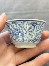 Ten Chinese blue and white cups and eleven saucers, Kangxi