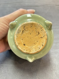 A small Chinese Longquan celadon cylindrical tripod censer, Ming