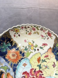 A pair of Chinese famille rose 'tobacco leaf' cups and saucers, Qianlong