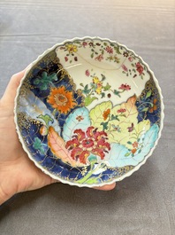 A pair of Chinese famille rose 'tobacco leaf' cups and saucers, Qianlong