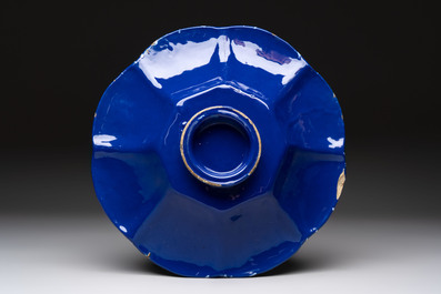 A Nevers white-splashed blue-ground '&agrave; la bougie' dish, France, late 17th C.